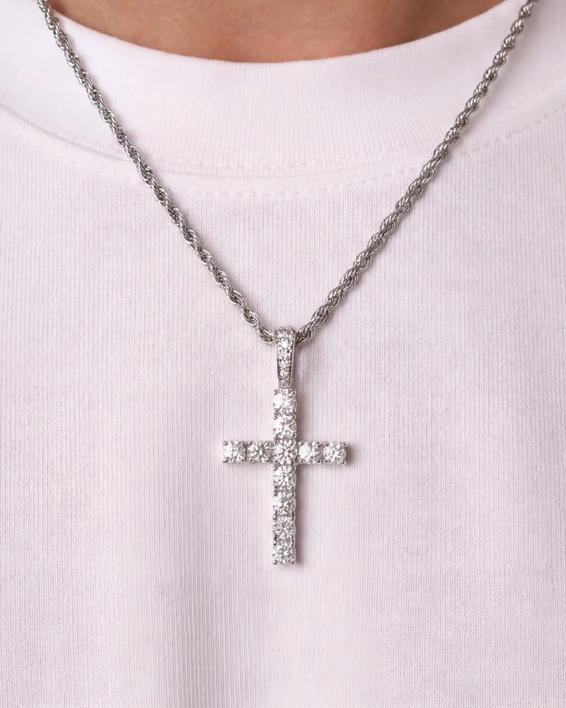 Iced cross chain silver on model close up image