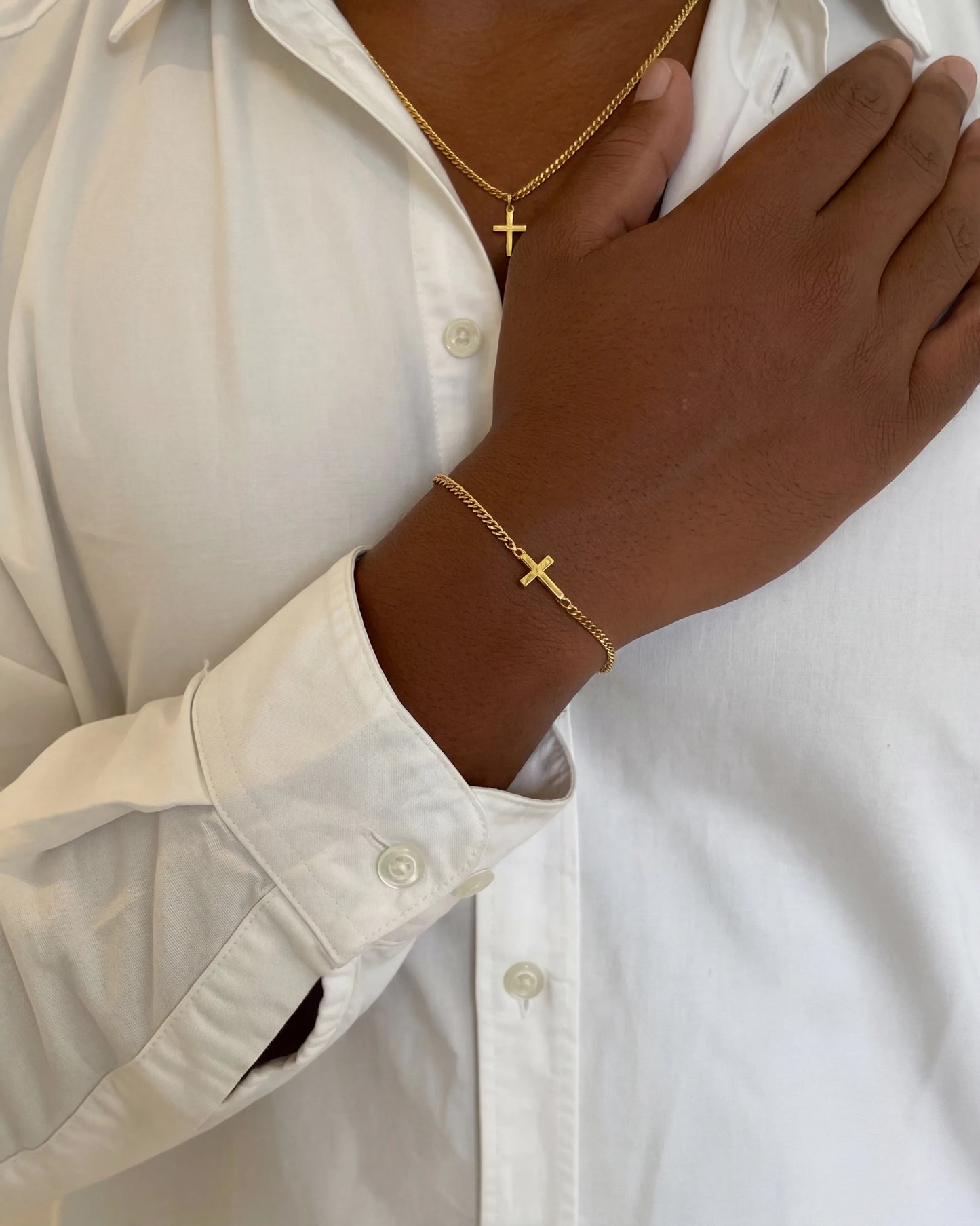 Gold cross chain + bracelet set on model image