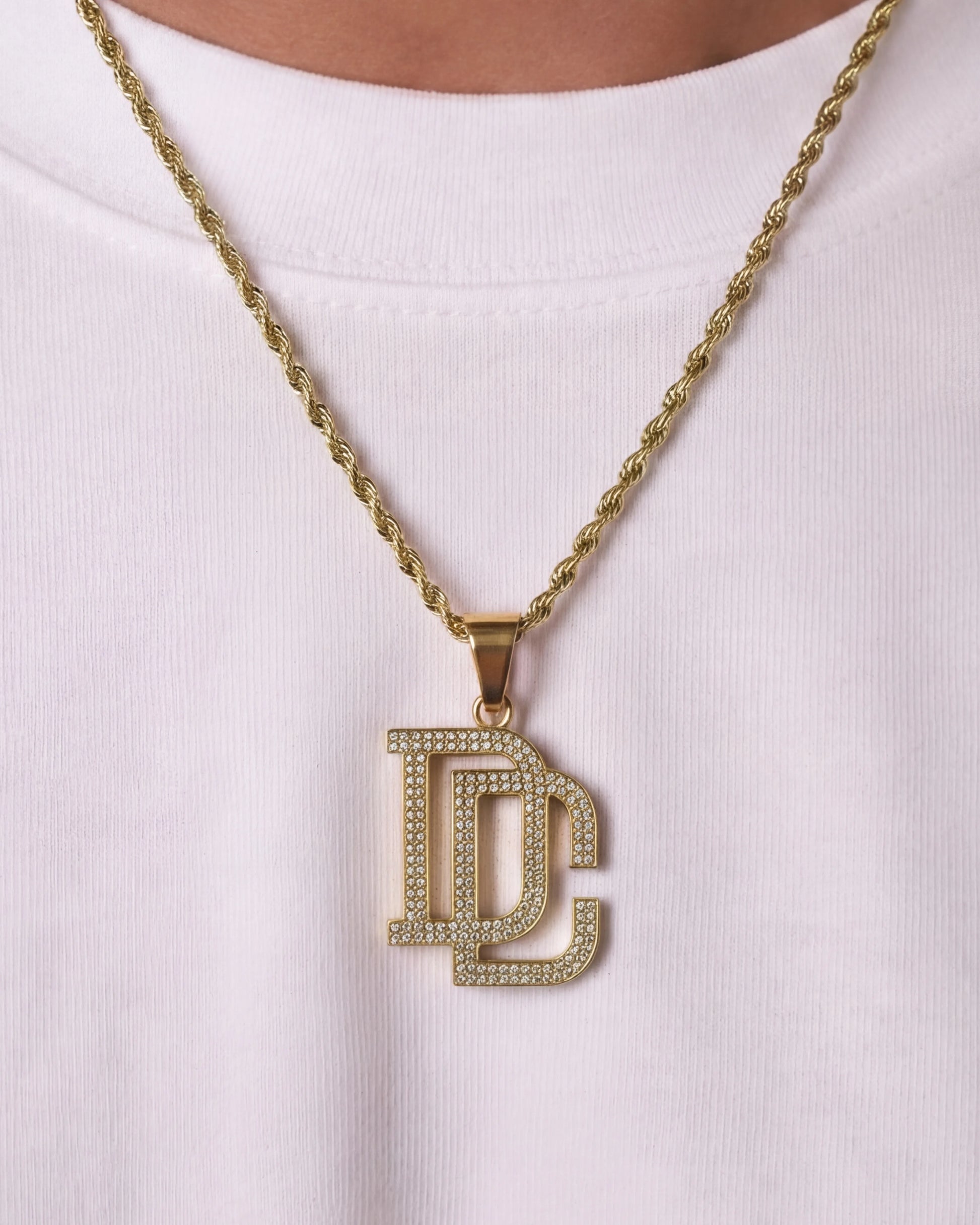 DC chain gold necklace close up on model photo