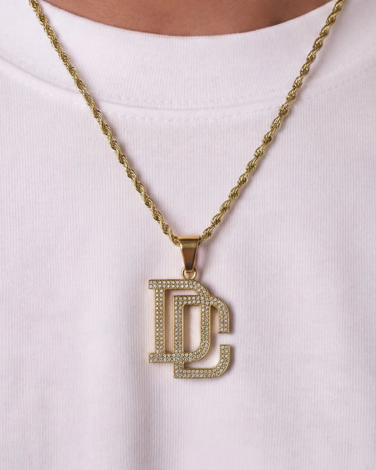 DC chain gold necklace close up on model photo