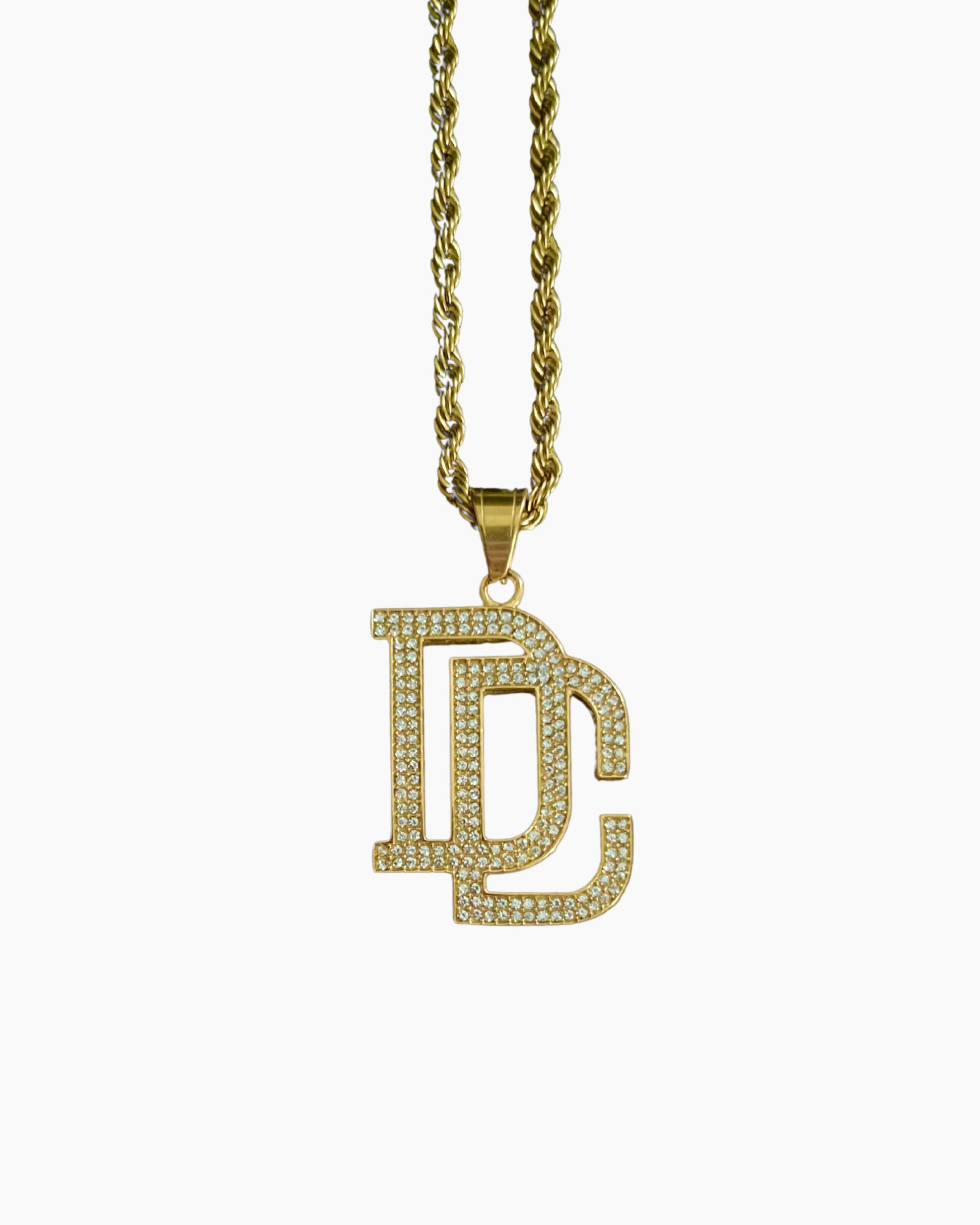 DC chain gold necklace studio photo