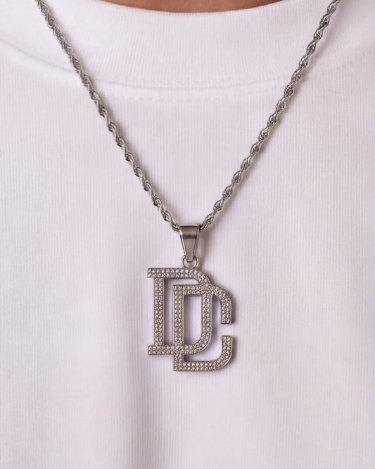 DC chain silver necklace close up on model photo
