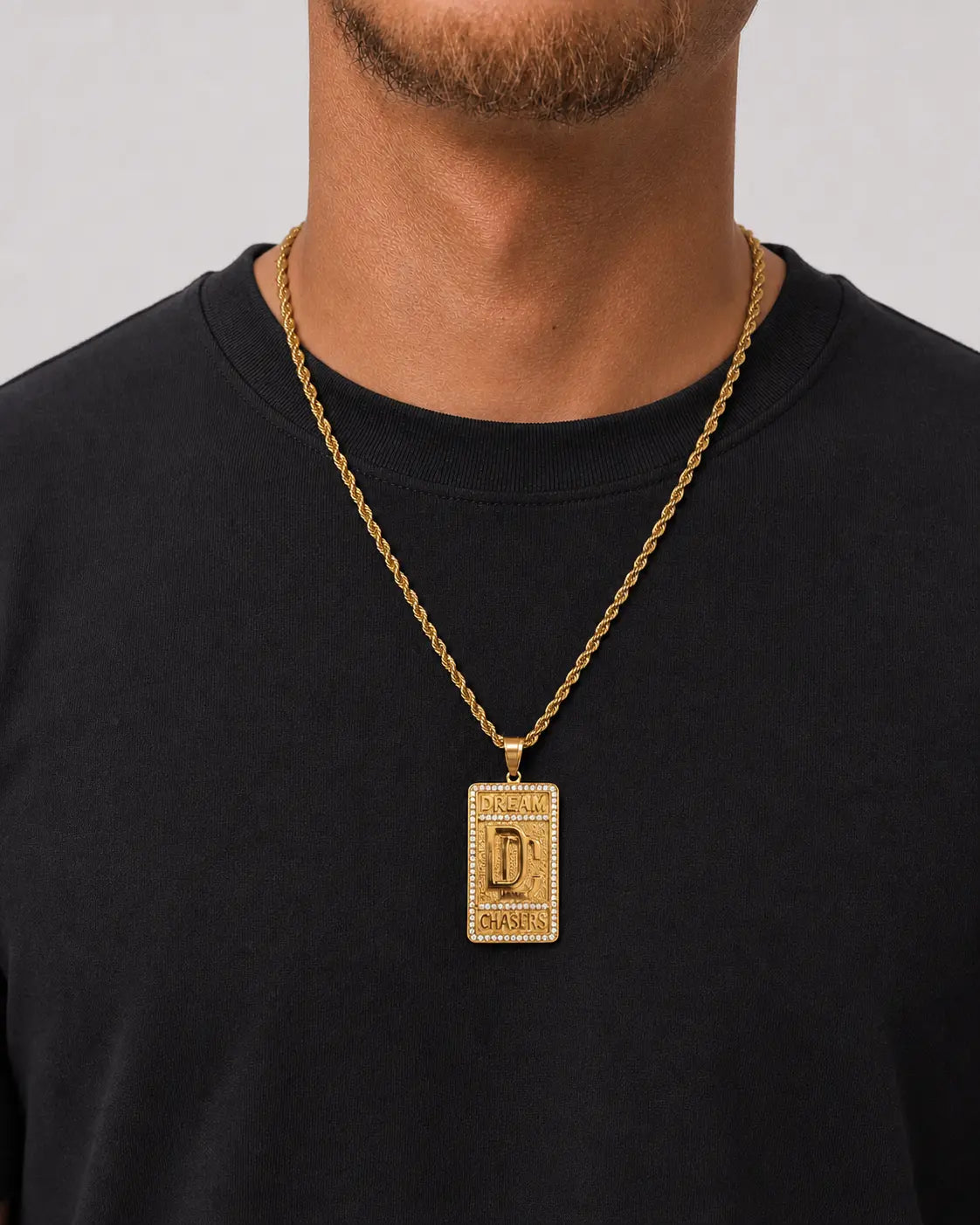 Dream chaser chain gold on model 