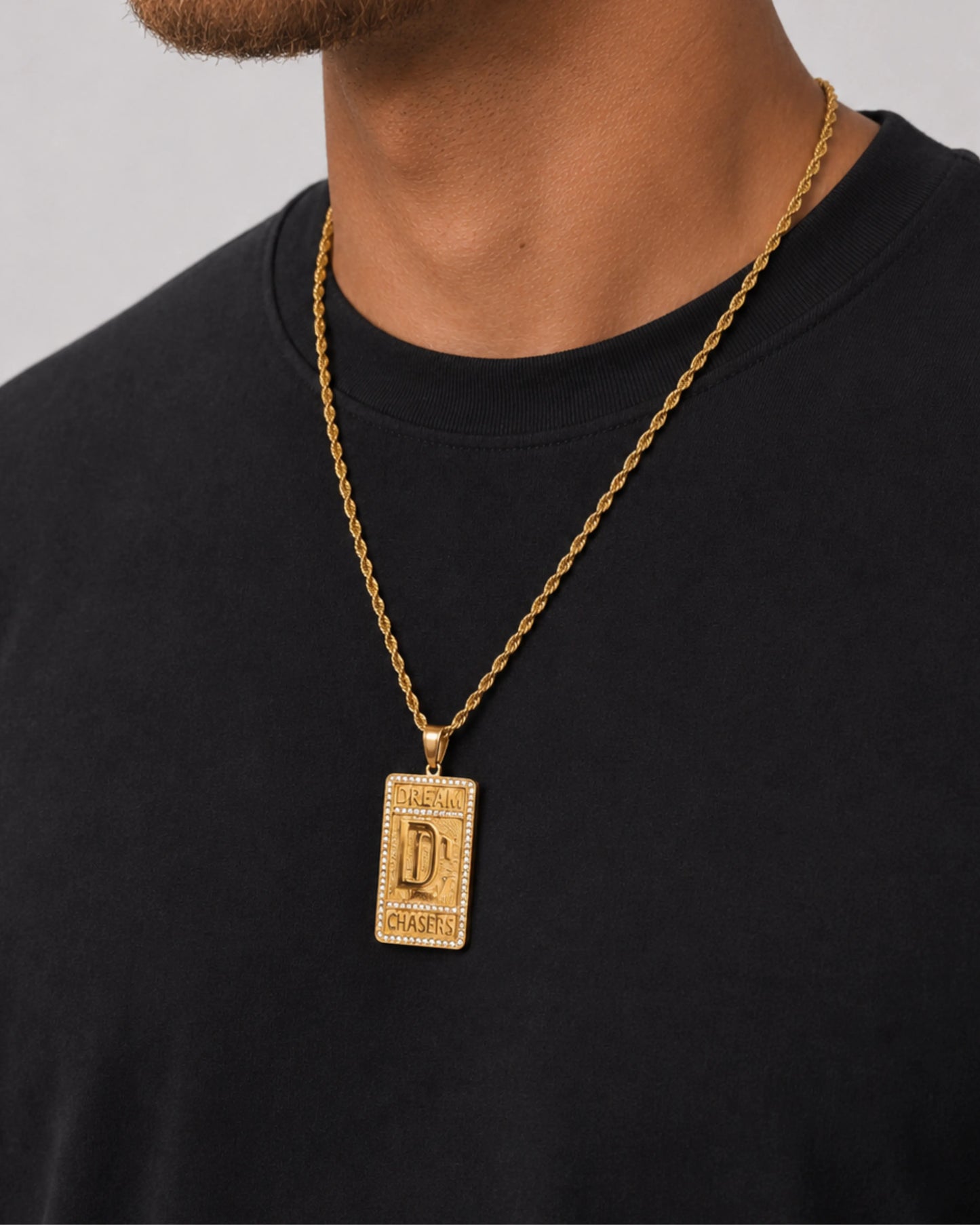 Dream chaser chain gold side profile on model 
