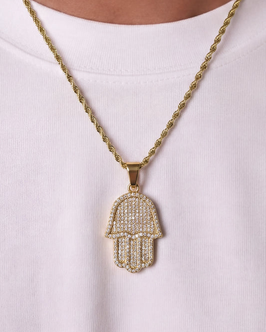 Hamsa hand chain gold on model close up photo