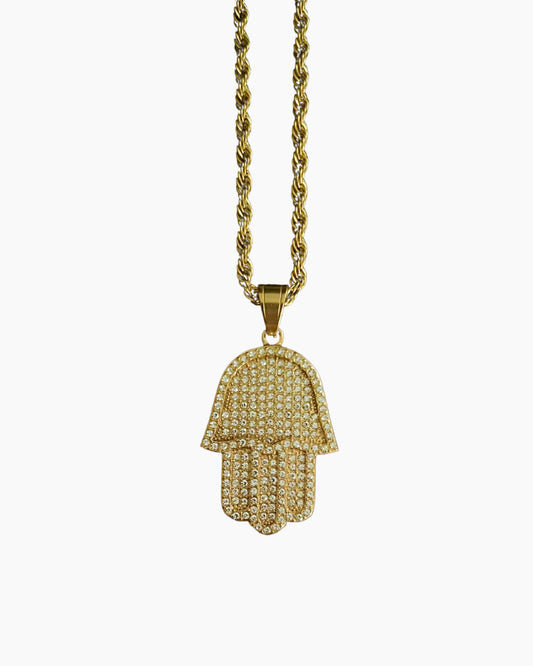 Hamsa hand chain gold on studio photo