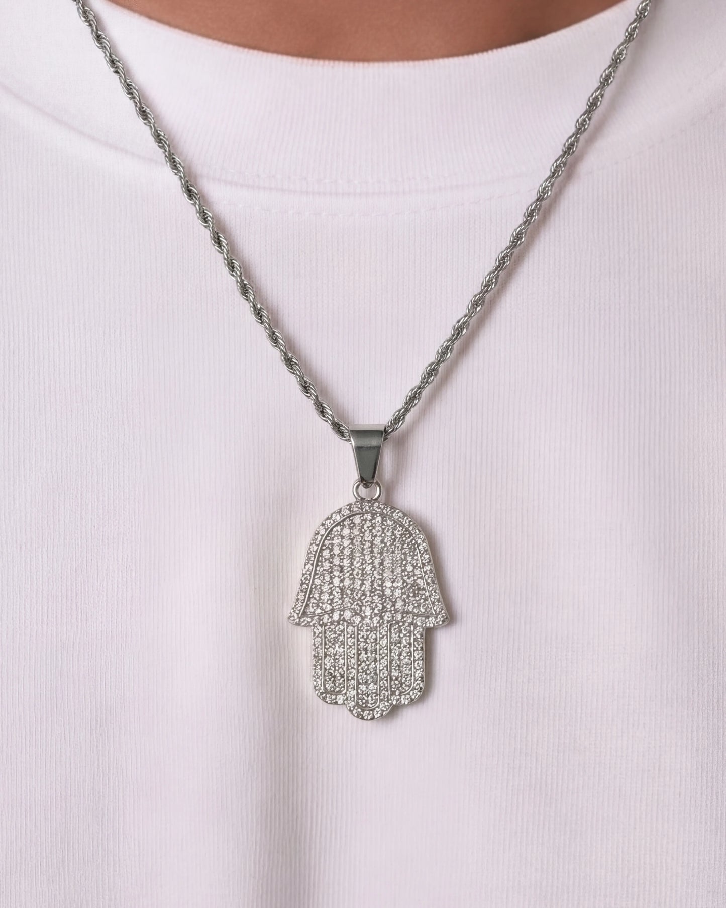 Hamsa hand chain silver on model close up photo