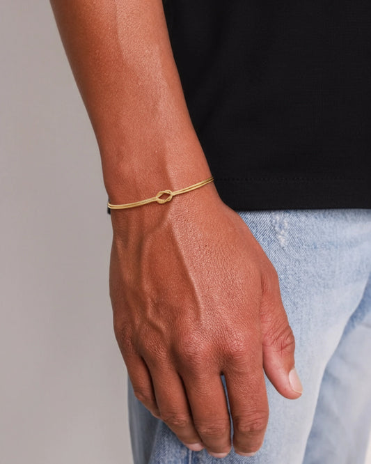 Eternal bracelet gold jewellery on model image